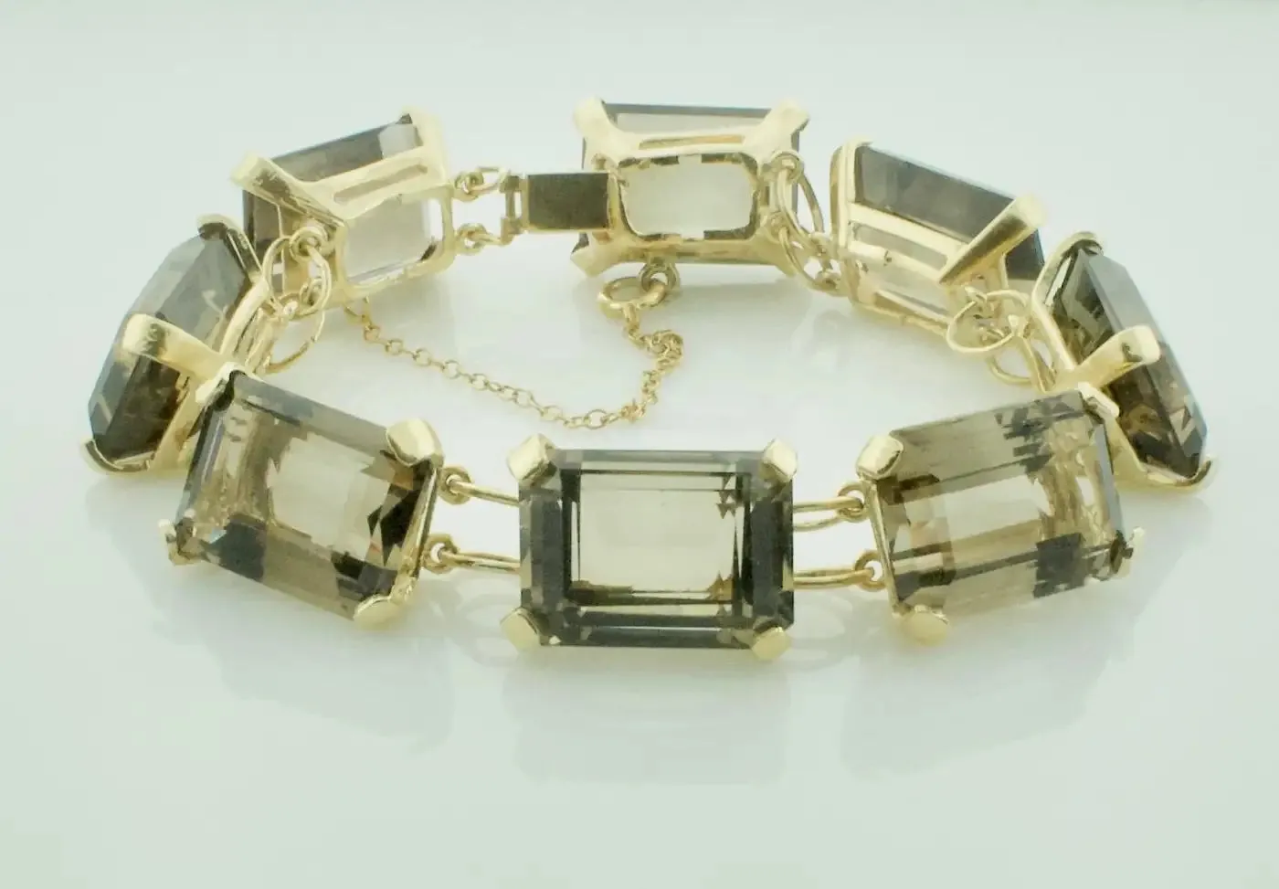 110.00 Carats Smokey Quartz Tennis Bracelet in Yellow Gold