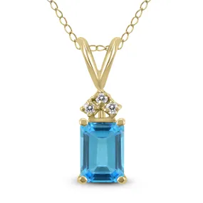 14K Yellow Gold 8X6Mm Emerald Shaped Blue Topaz And Three Stone Diamond Pendant