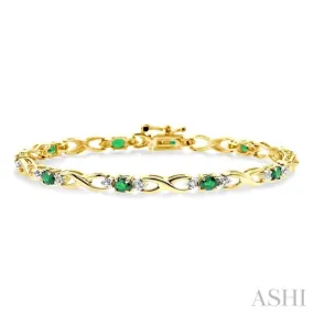 4x3 MM Oval Cut Emerald and 1/10 Ctw Single Cut Diamond Bracelet in 10K Yellow Gold