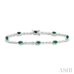 5x3MM Oval Cut Emerald and 1/20 Ctw Single Cut Diamond Bracelet in 14K White Gold