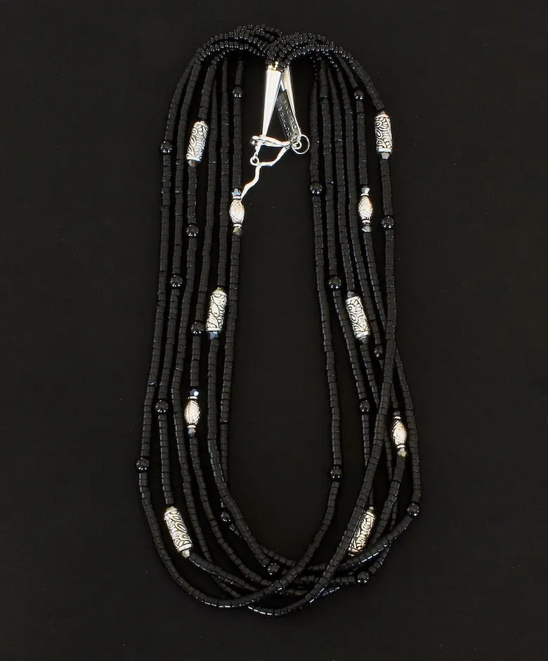 Black Onyx Heishi 6-Strand Necklace with Onyx Rounds, Ornate Sterling Silver Cylinder Beads, and Sterling Silver Cones & Toggle Clasp