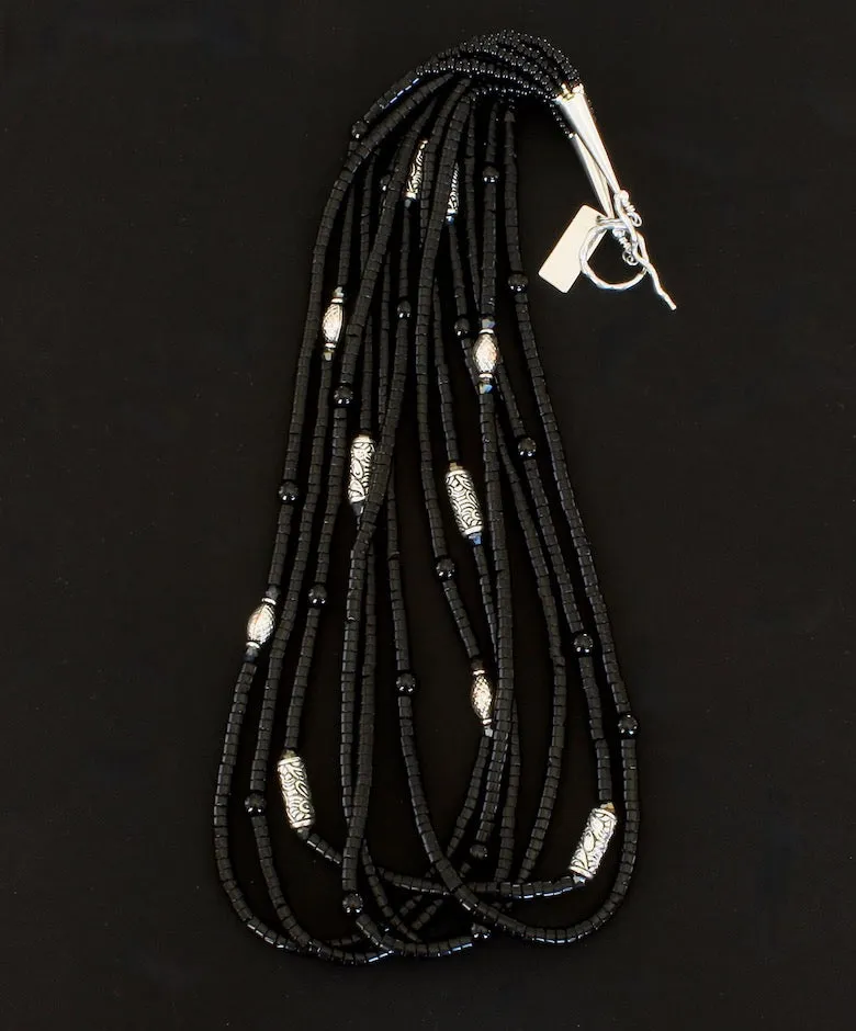 Black Onyx Heishi 6-Strand Necklace with Onyx Rounds, Ornate Sterling Silver Cylinder Beads, and Sterling Silver Cones & Toggle Clasp