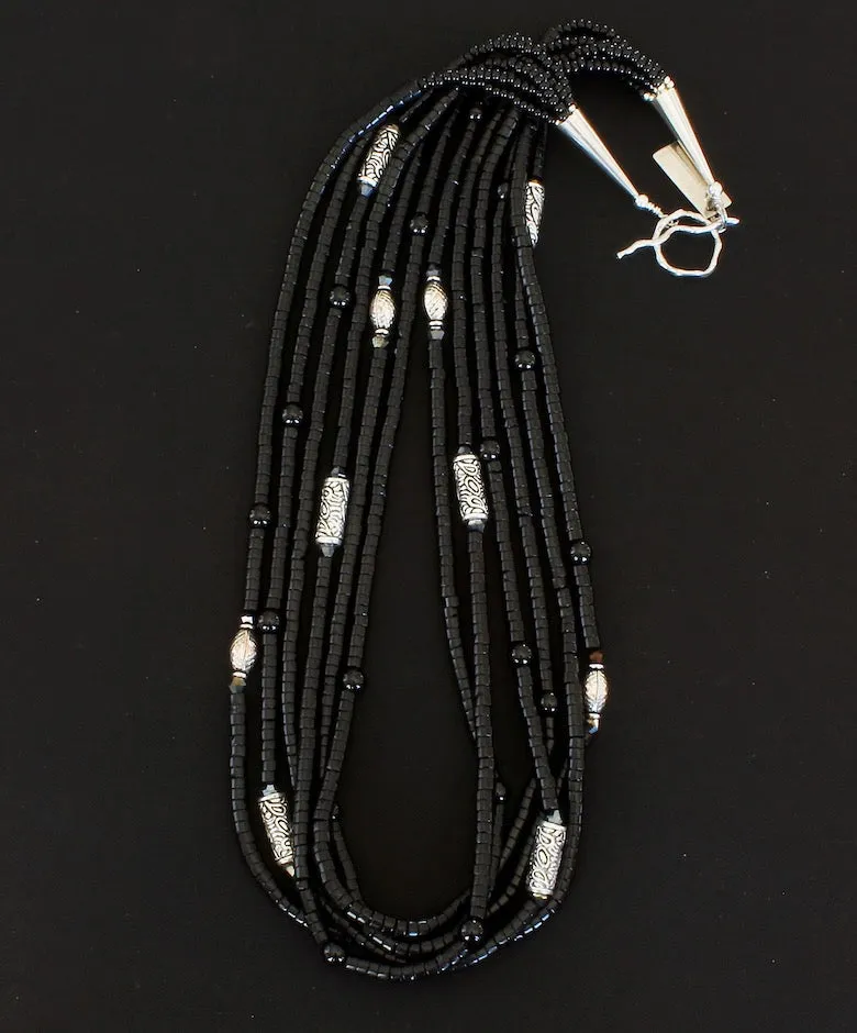 Black Onyx Heishi 6-Strand Necklace with Onyx Rounds, Ornate Sterling Silver Cylinder Beads, and Sterling Silver Cones & Toggle Clasp