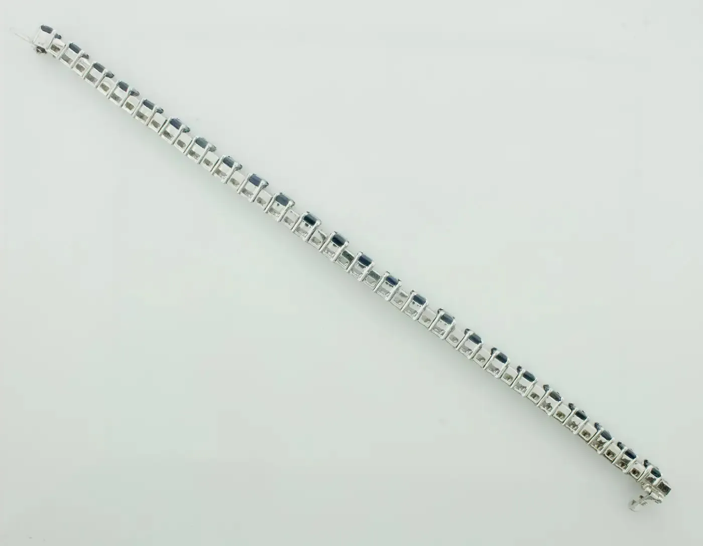 Emerald Cut Sapphire and Diamond Tennis Bracelet in 18k