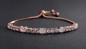 Fiery Opal Adjustable Tennis Bracelet Made with Swarovski Elements in Gold Plating by Nina Grace