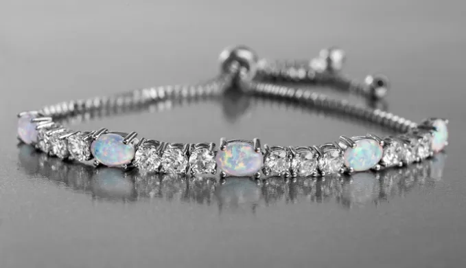 Fiery Opal Adjustable Tennis Bracelet Made with Swarovski Elements in Gold Plating by Nina Grace