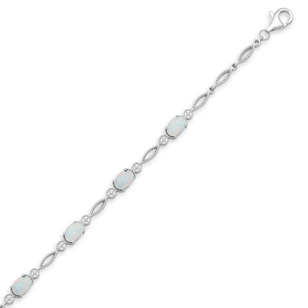 Jewelili Sterling Silver with Oval Shape Created Opal Fashion Bracelet, 7.5 Inch